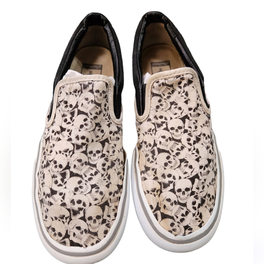 Vans custom skull slip on sneakers size 8